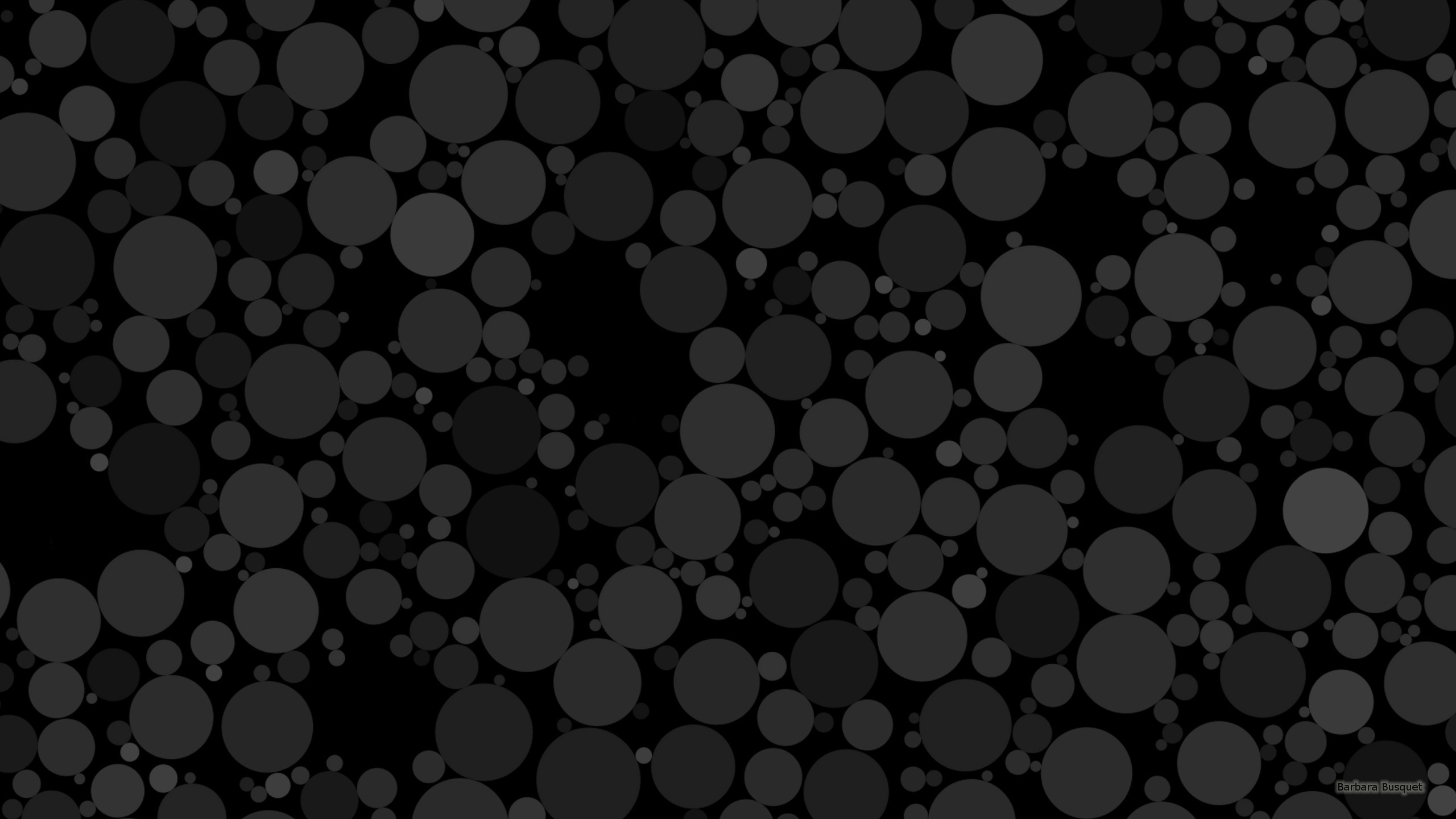 Black wallpaper with dots.