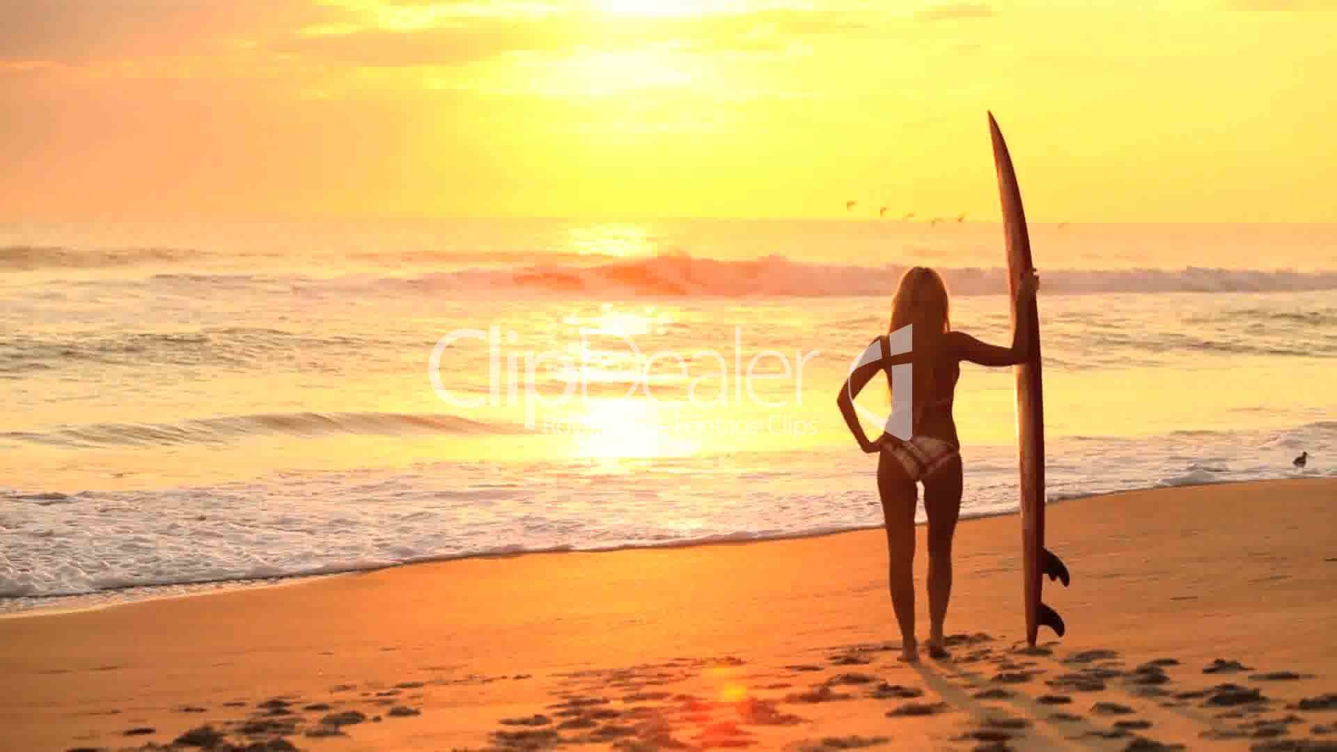 13–934789-Surfer Girl at Sunrise.jpg (1920Ã1080)