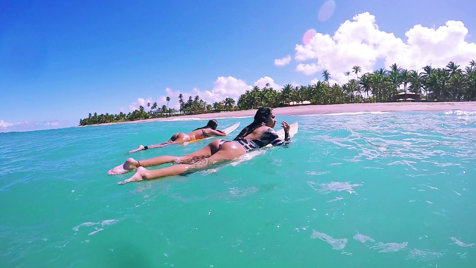 Two Attractive Surf Girls Laying On Surfboard Waiting To Catch Wave, Surfing Stock Video Footage – VideoBlocks