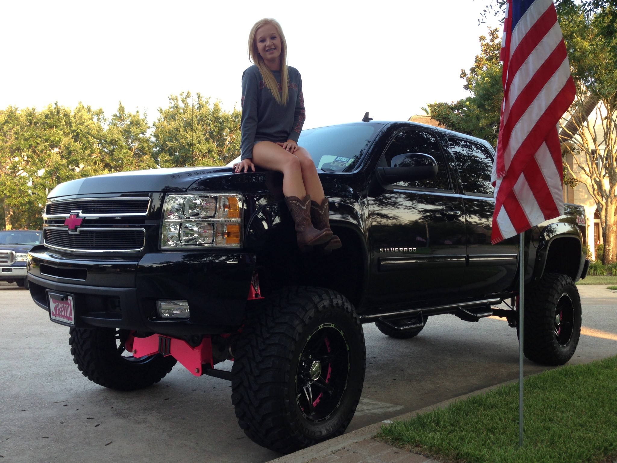 lifted Chevy Silverado trucks except minus the pink. 