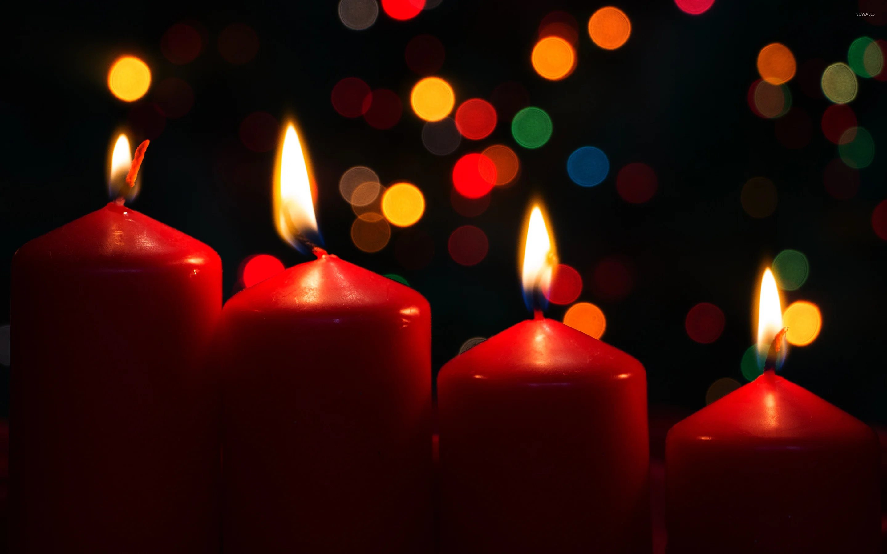 Burning Advent candles wallpaper