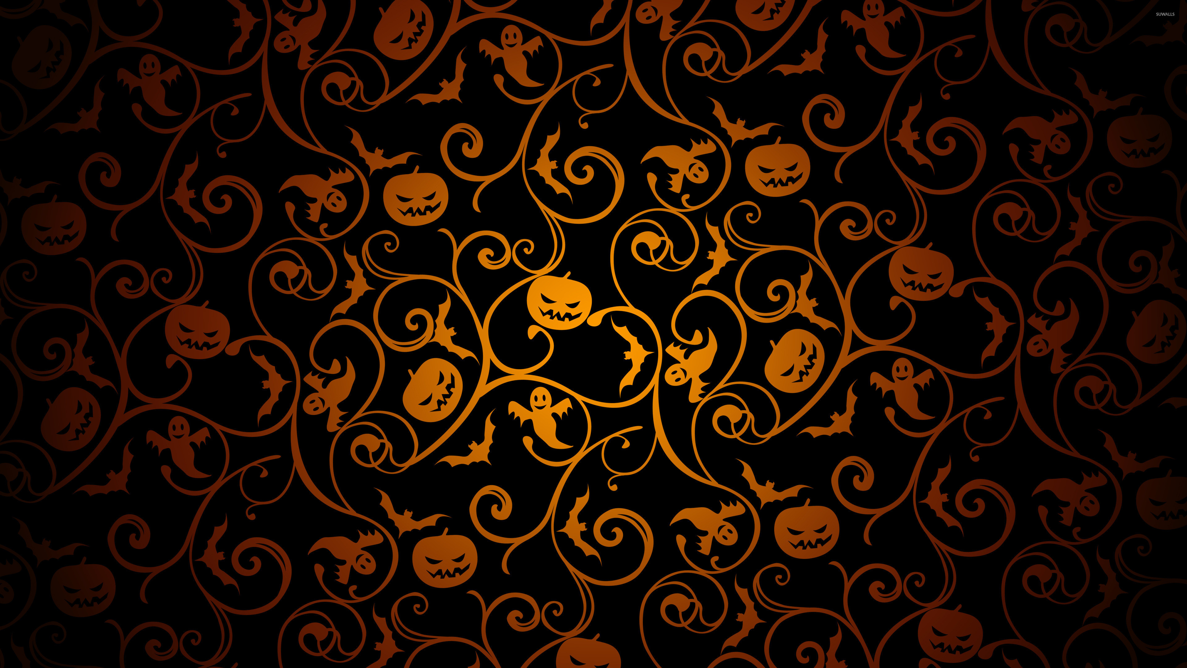Halloween pattern on black wallpaper