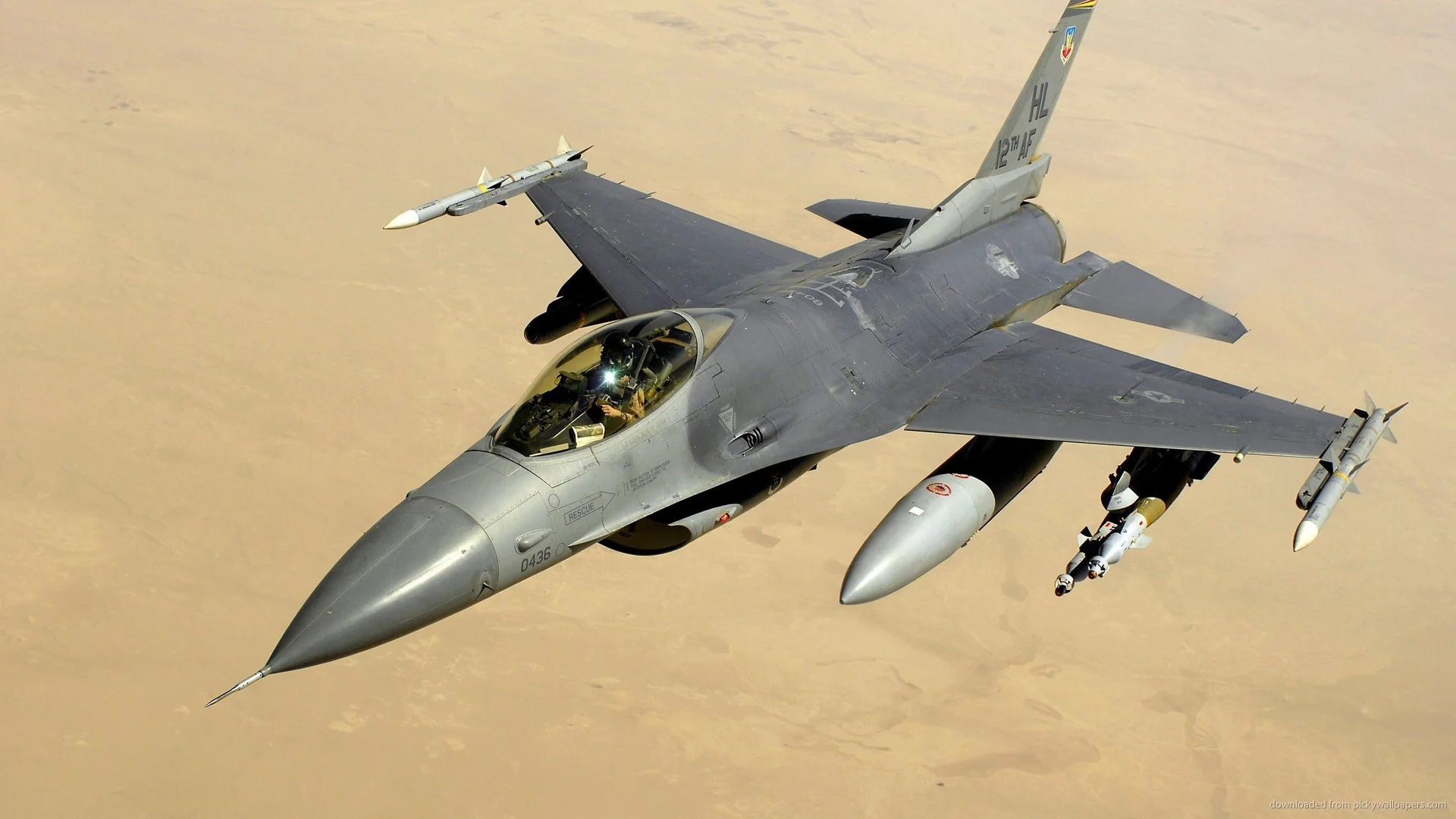 2560×1440 F 16 Fighting Falcon Over The Desert wallpaper