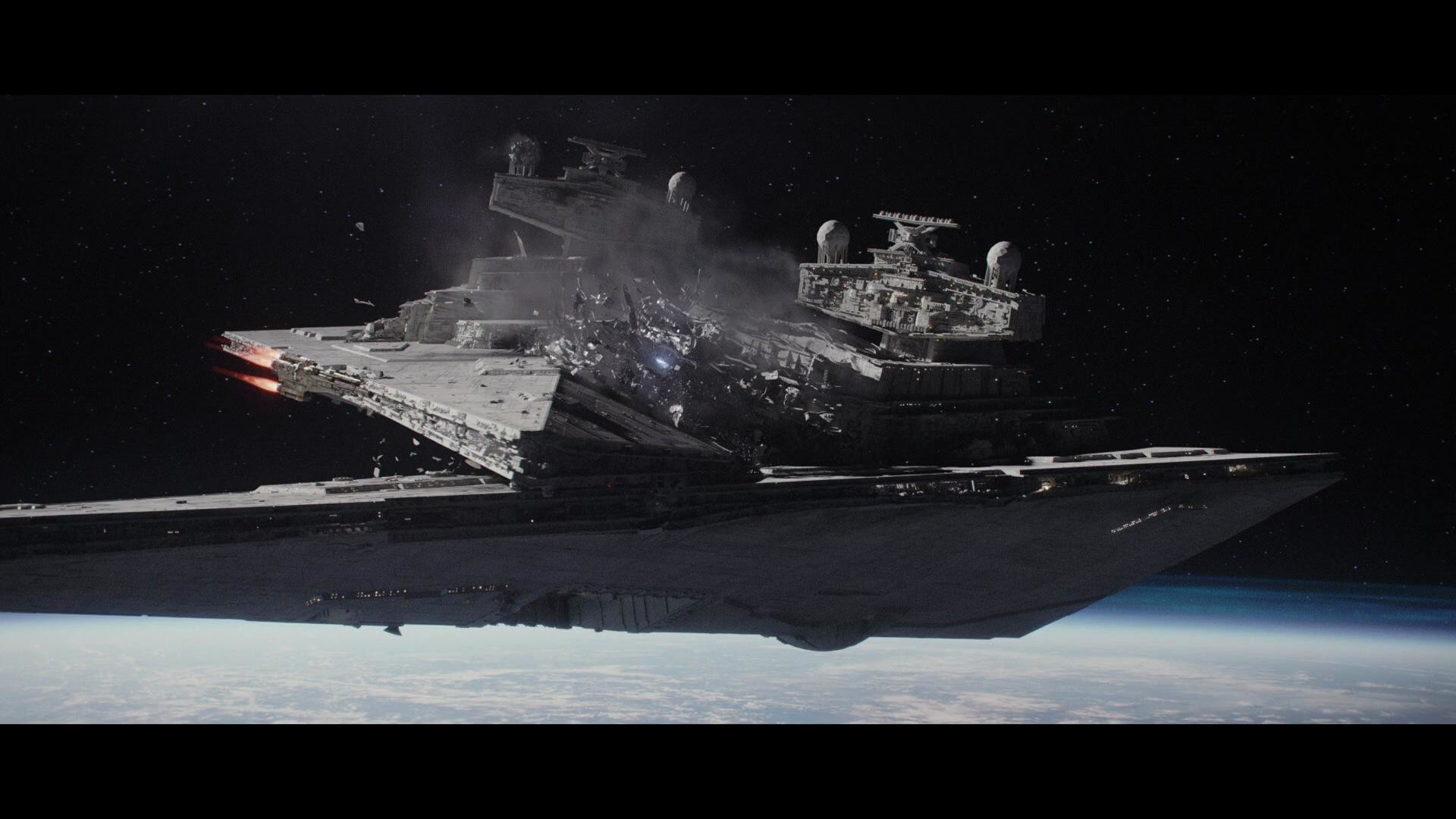 Wallpaper of a Star Destroyer destroying another Star Destroyer Rogue One