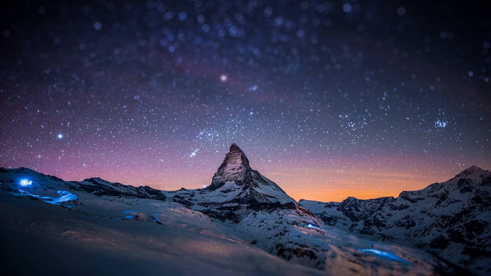 Preview wallpaper mountain, peak, stars, sky, night, light, snow 1920×1080