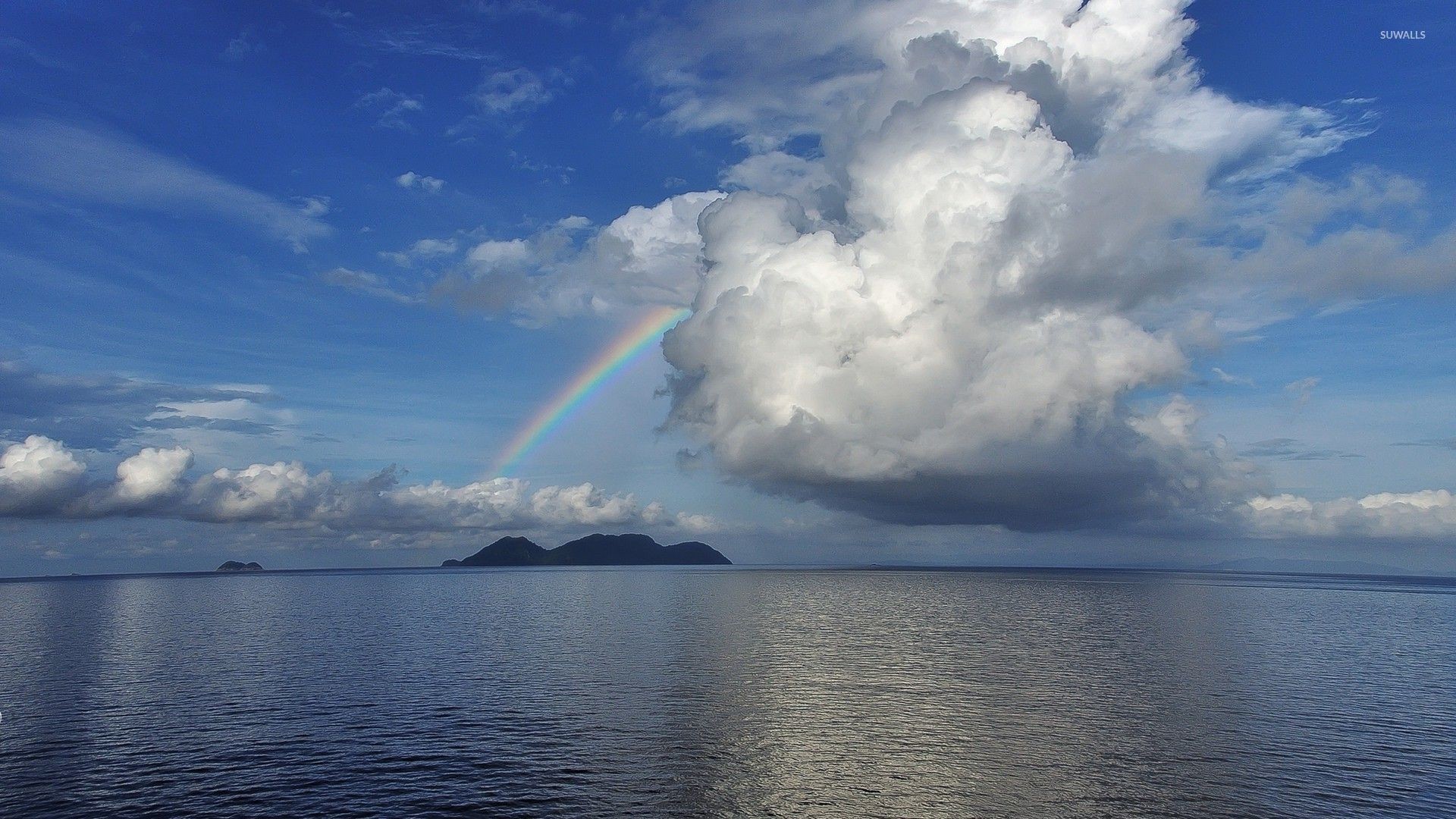 Rainbow in the middle of the ocean wallpaper jpg