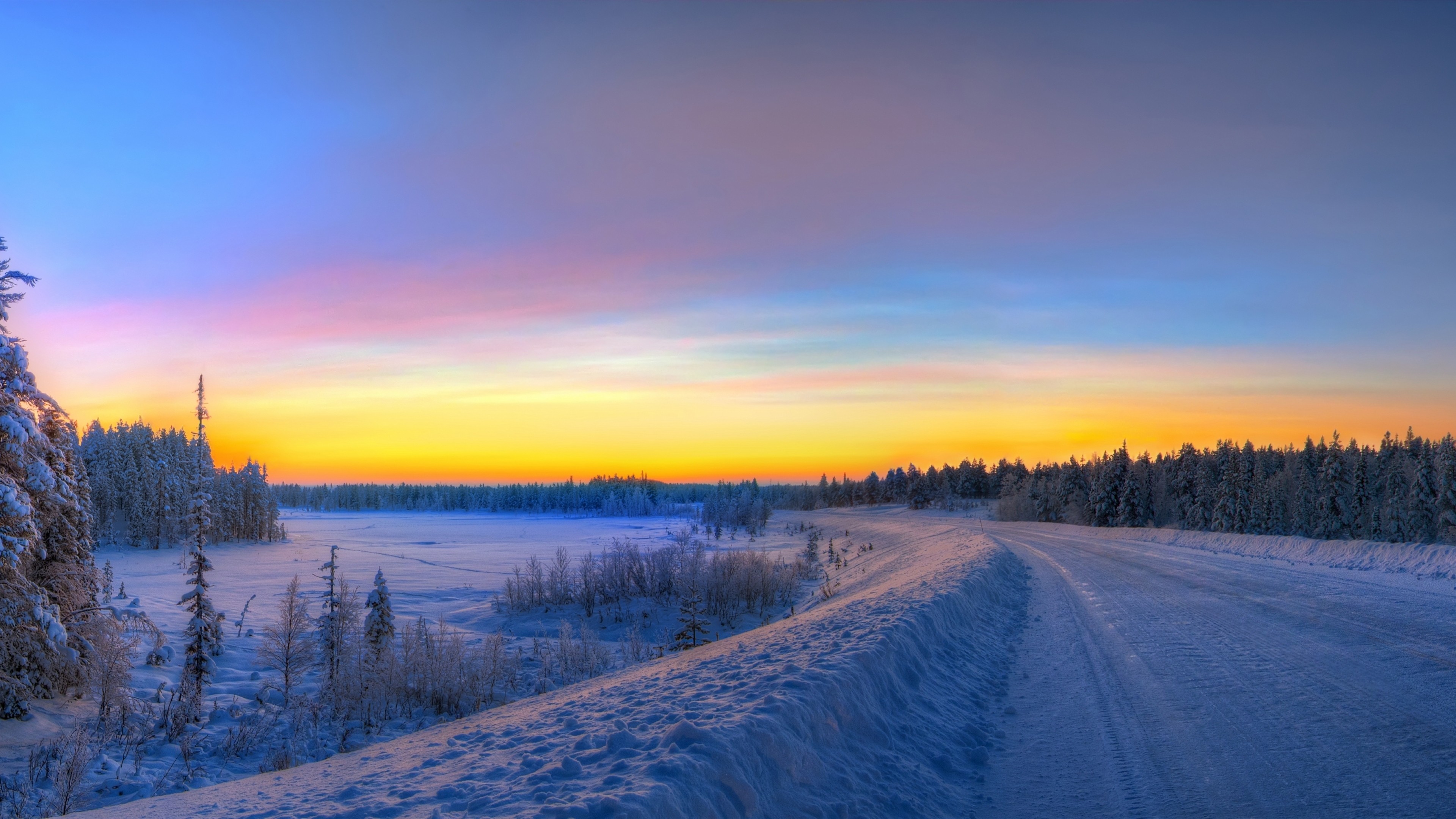 Preview wallpaper panorama, sunset, road, winter, landscape 3840×2160