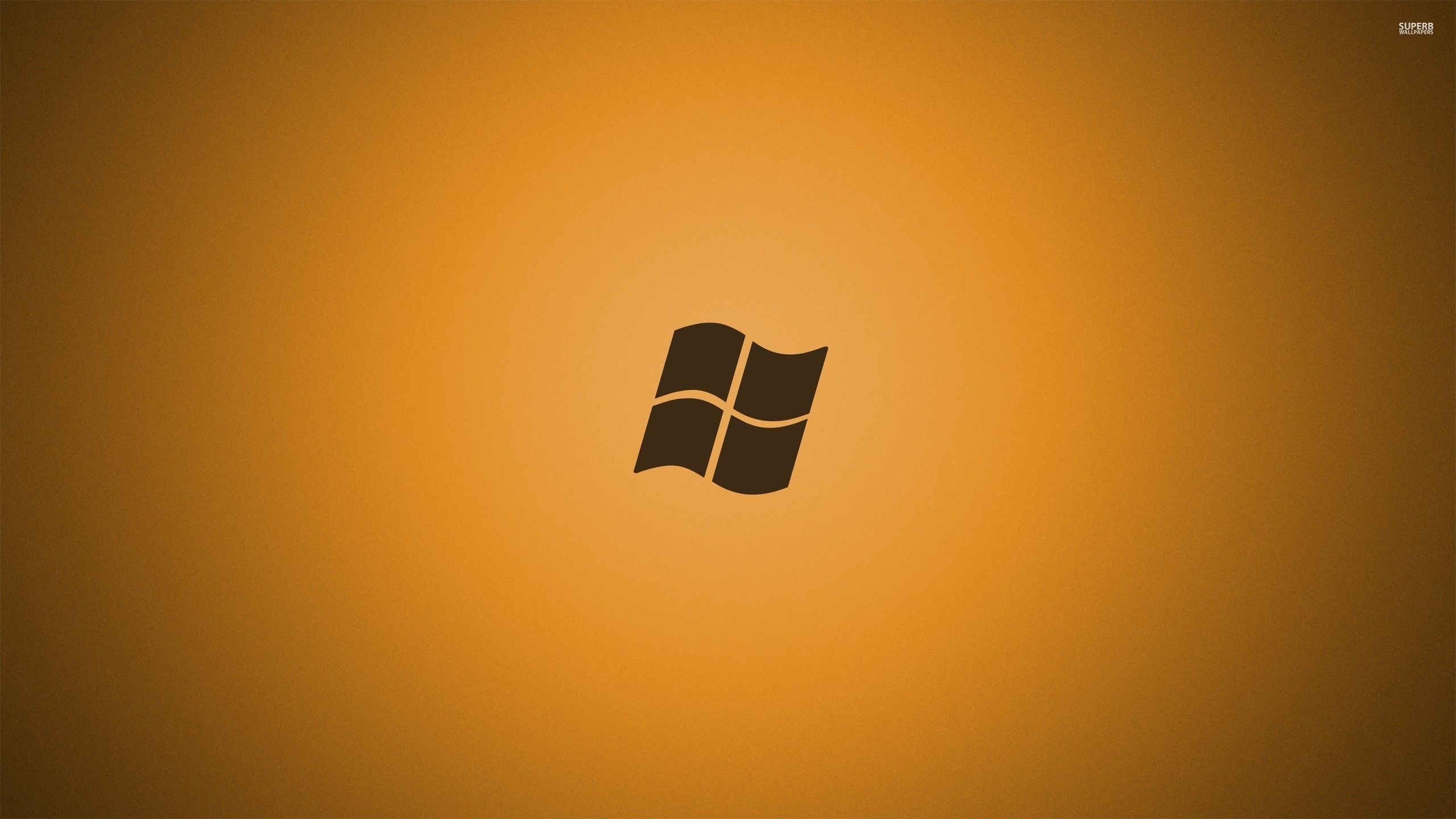 Windows 7 logo on golden background 51081 2560×1440