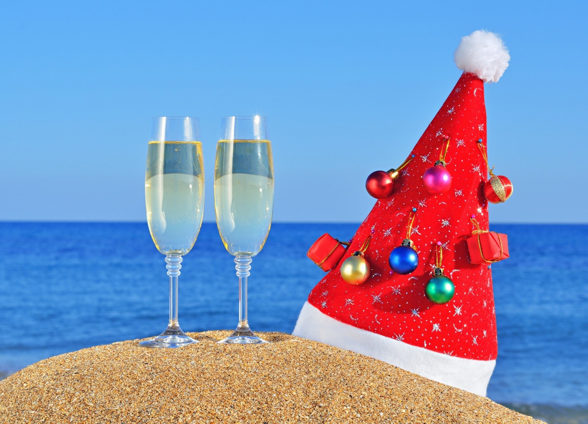 Sand beach christmas new year holiday hats hat summer ocean sea sea cups christmas