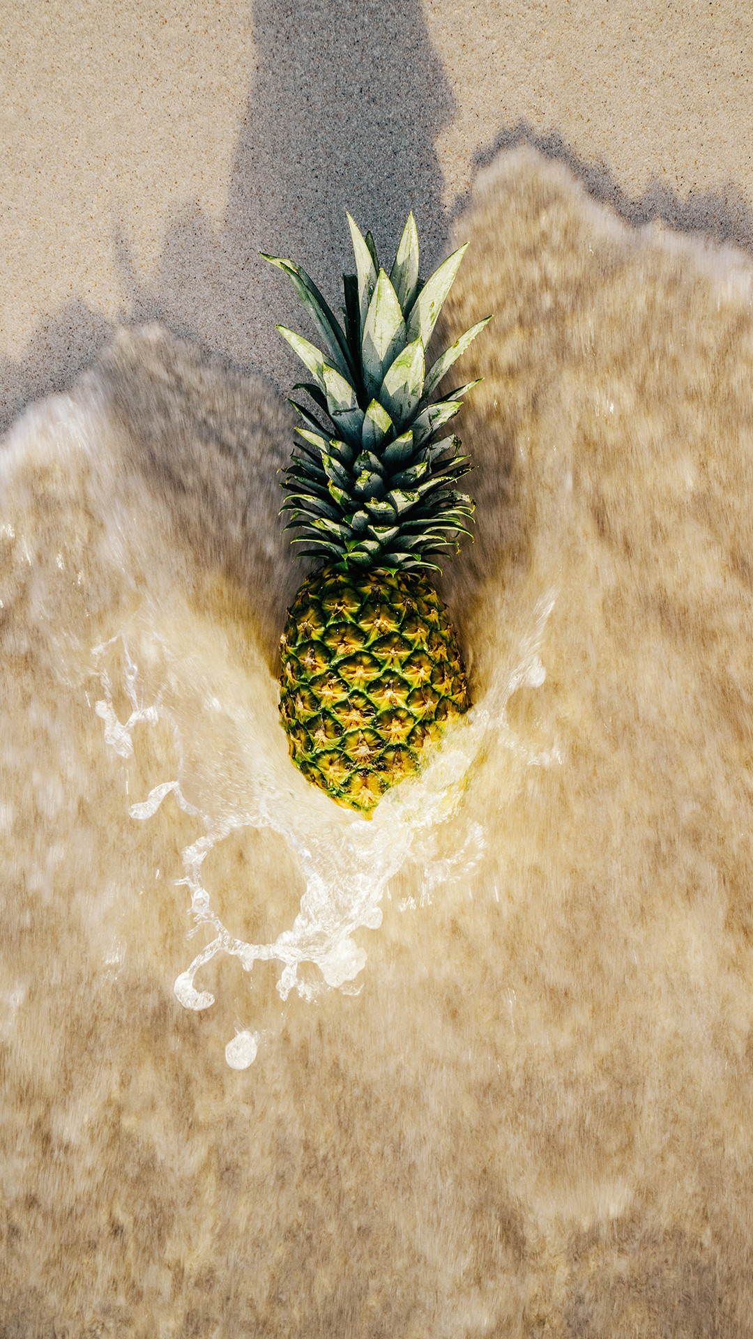 Download this rad pineapple wallpaper for your iPhone