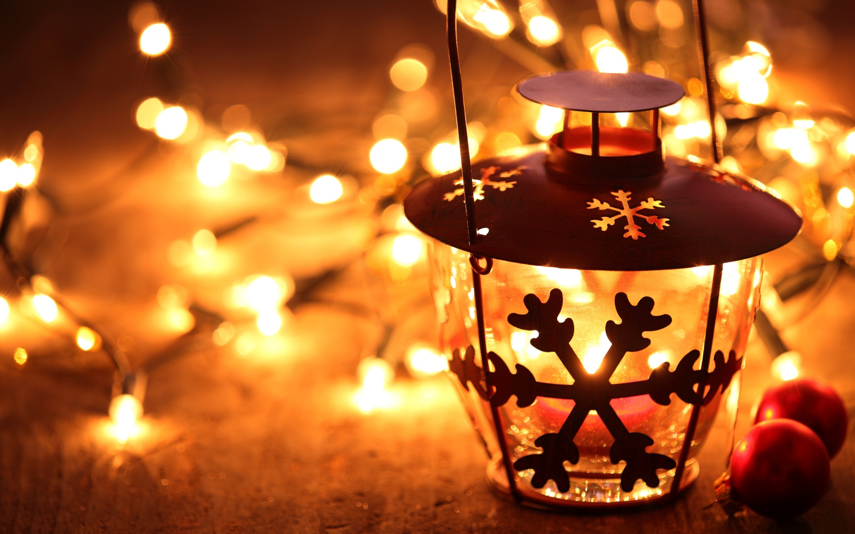 Snowflake lantern on wooden floor with yellow candle light