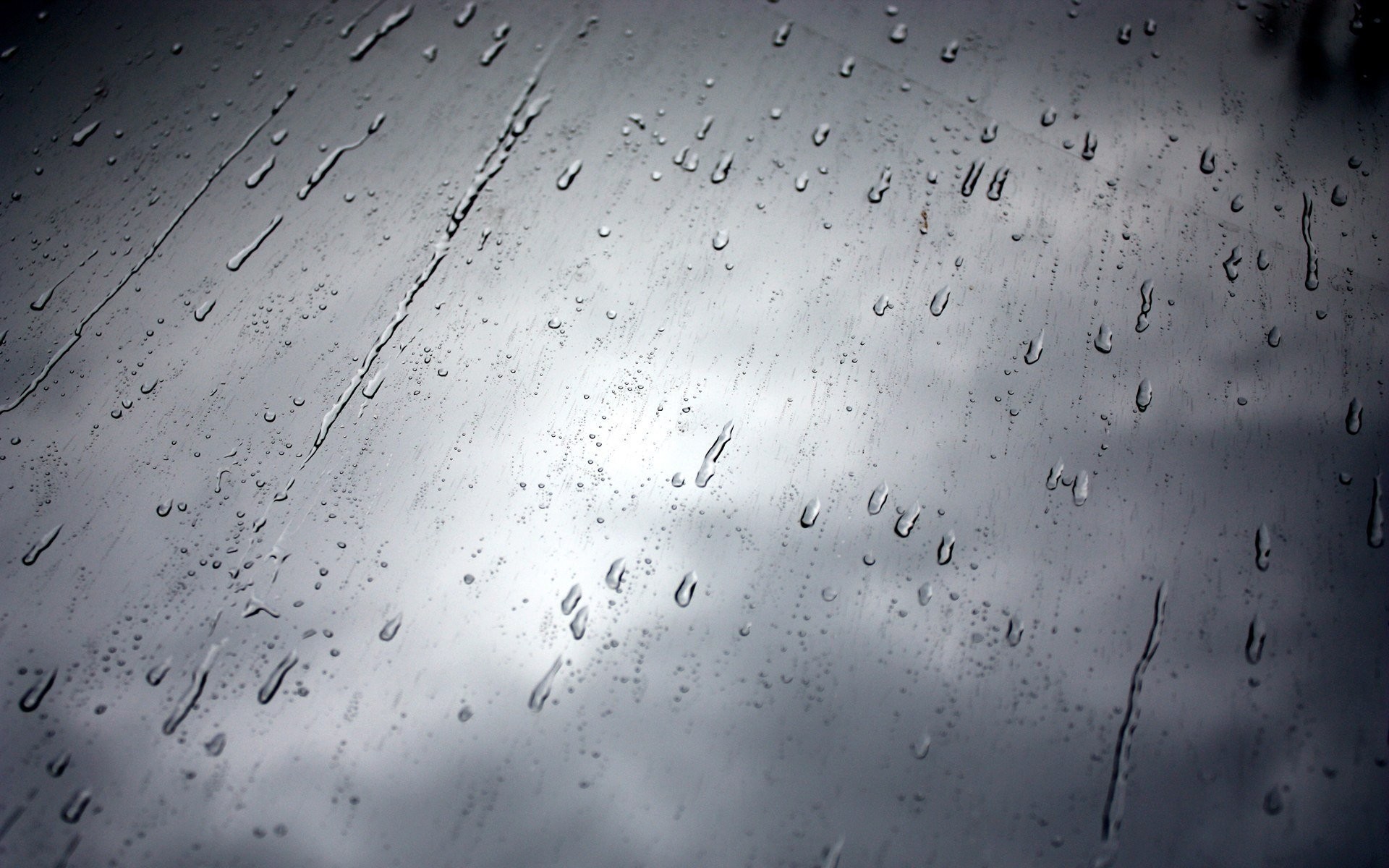 rainy day rain glass window drops sky black and white