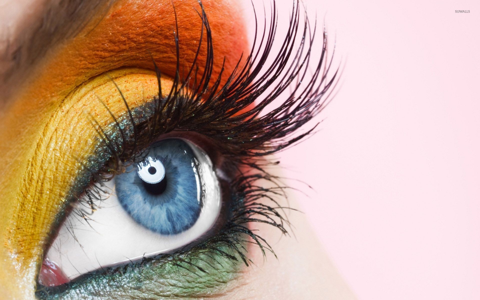 Orange and yellow makeup on the blue eyes wallpaper jpg