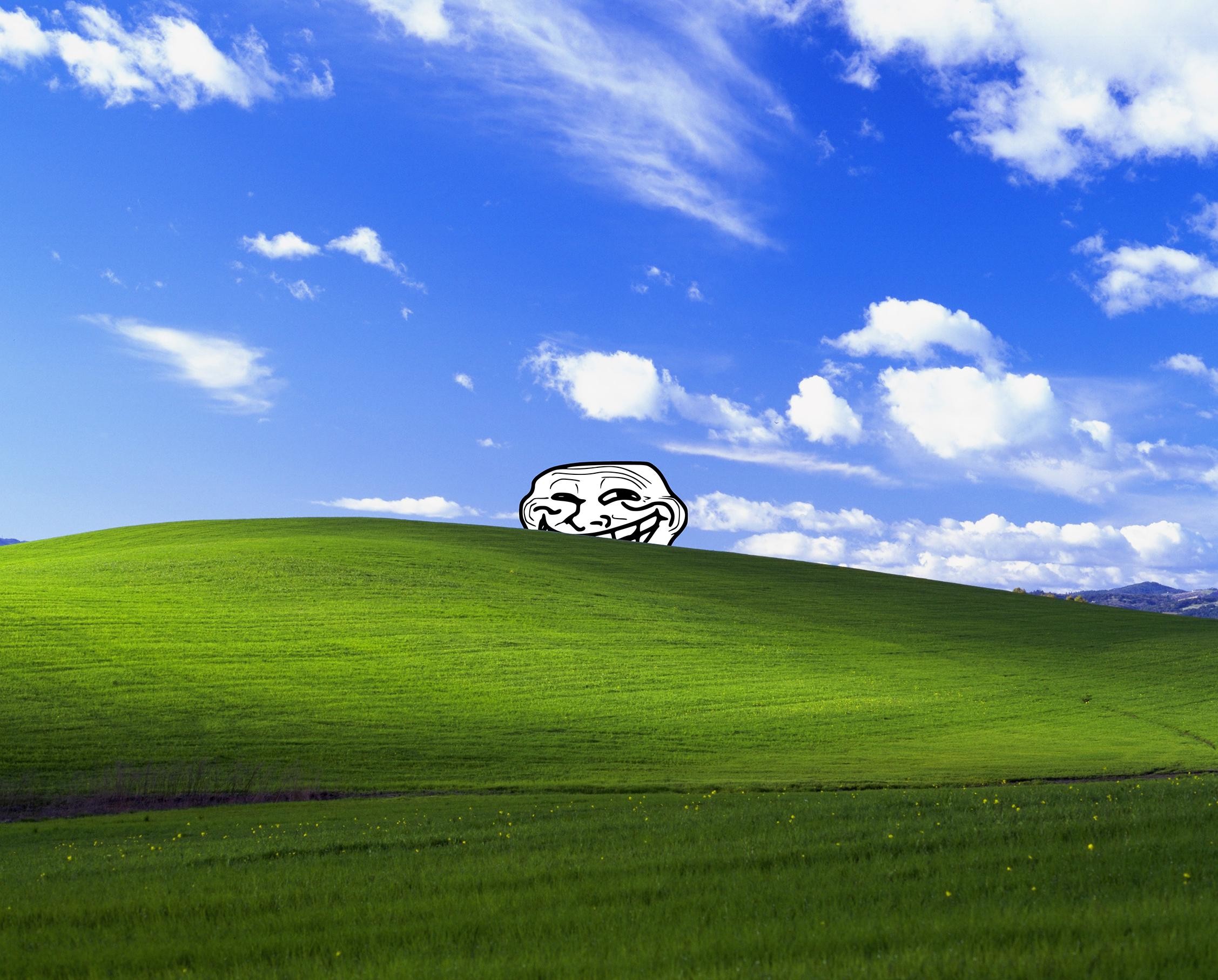 Troll face peeking out from behind the old Bliss wallpaper hill 2255×1814