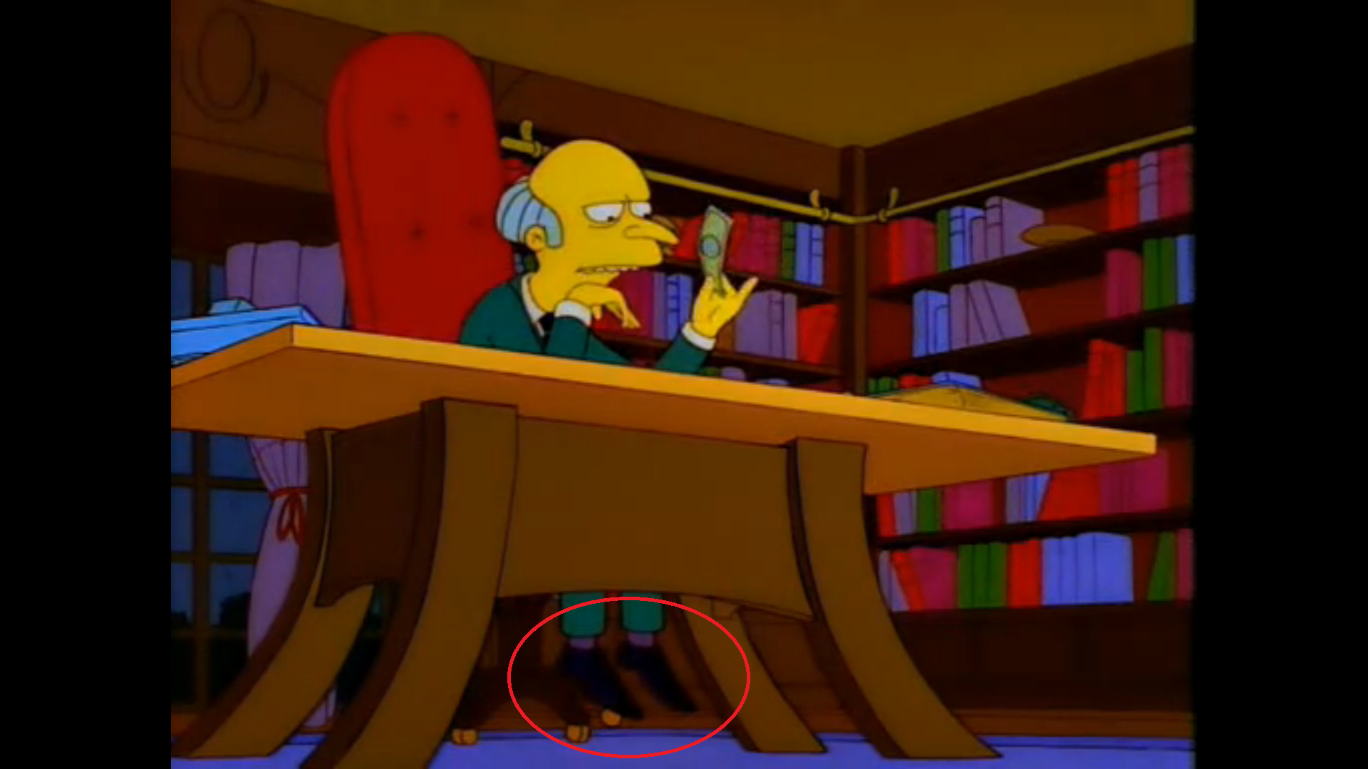 Mr. Burns feet dont touch the floor under his desk