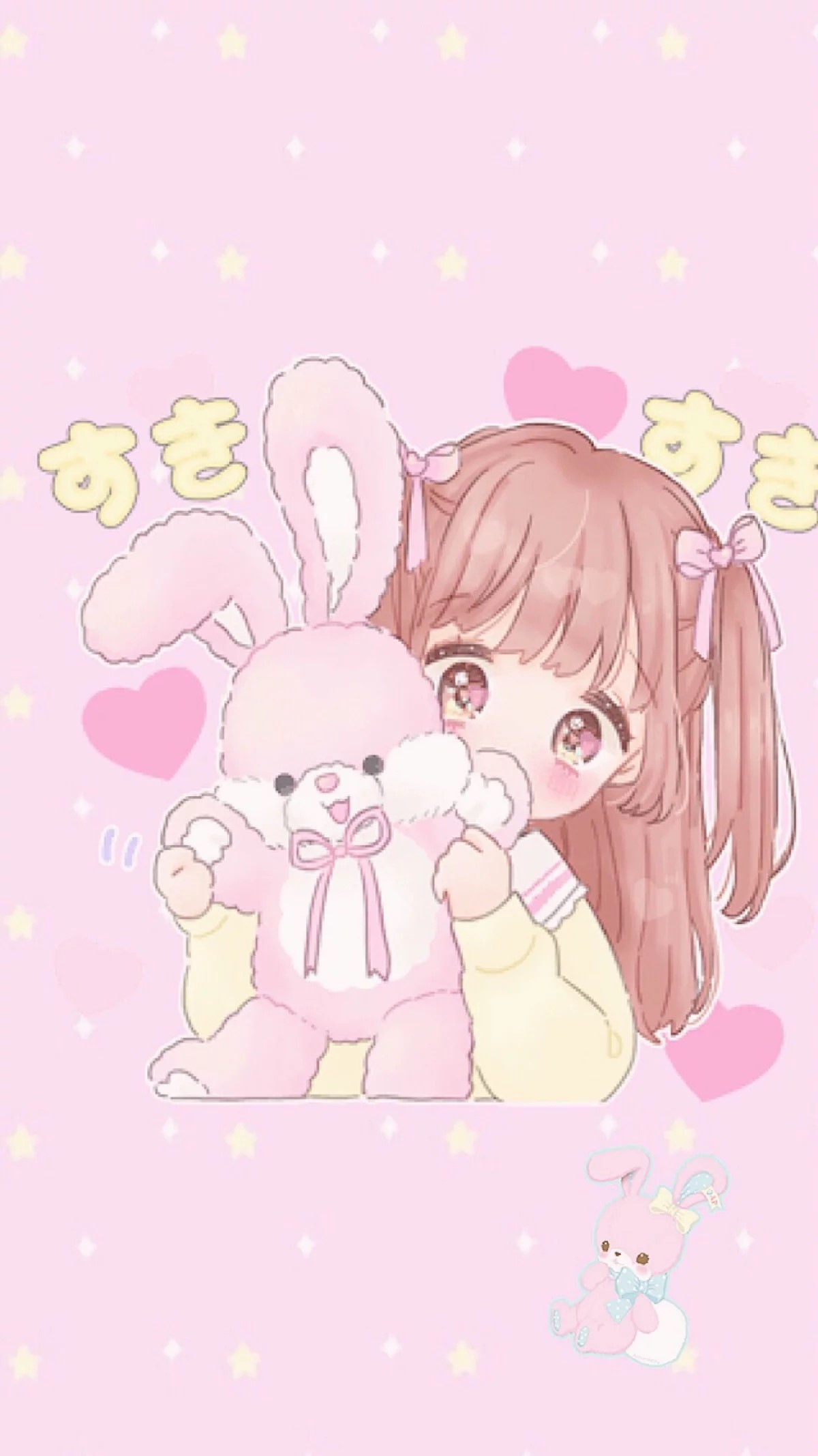 A little girl with a pink rabbit