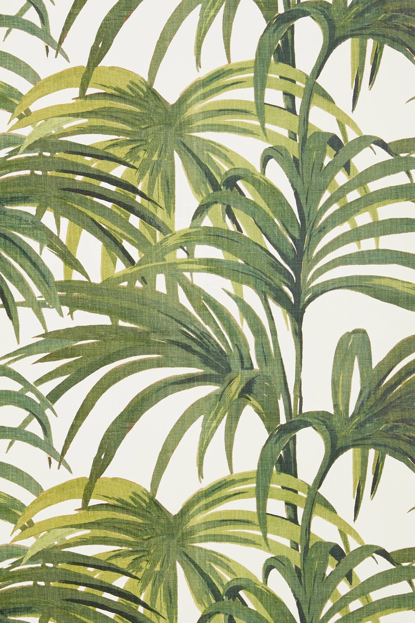 Palmeral is an Art Deco inspired patio print featuring an explosion of palm leaves reminiscent of Palm Springs. The print pays homage to Loddiges,