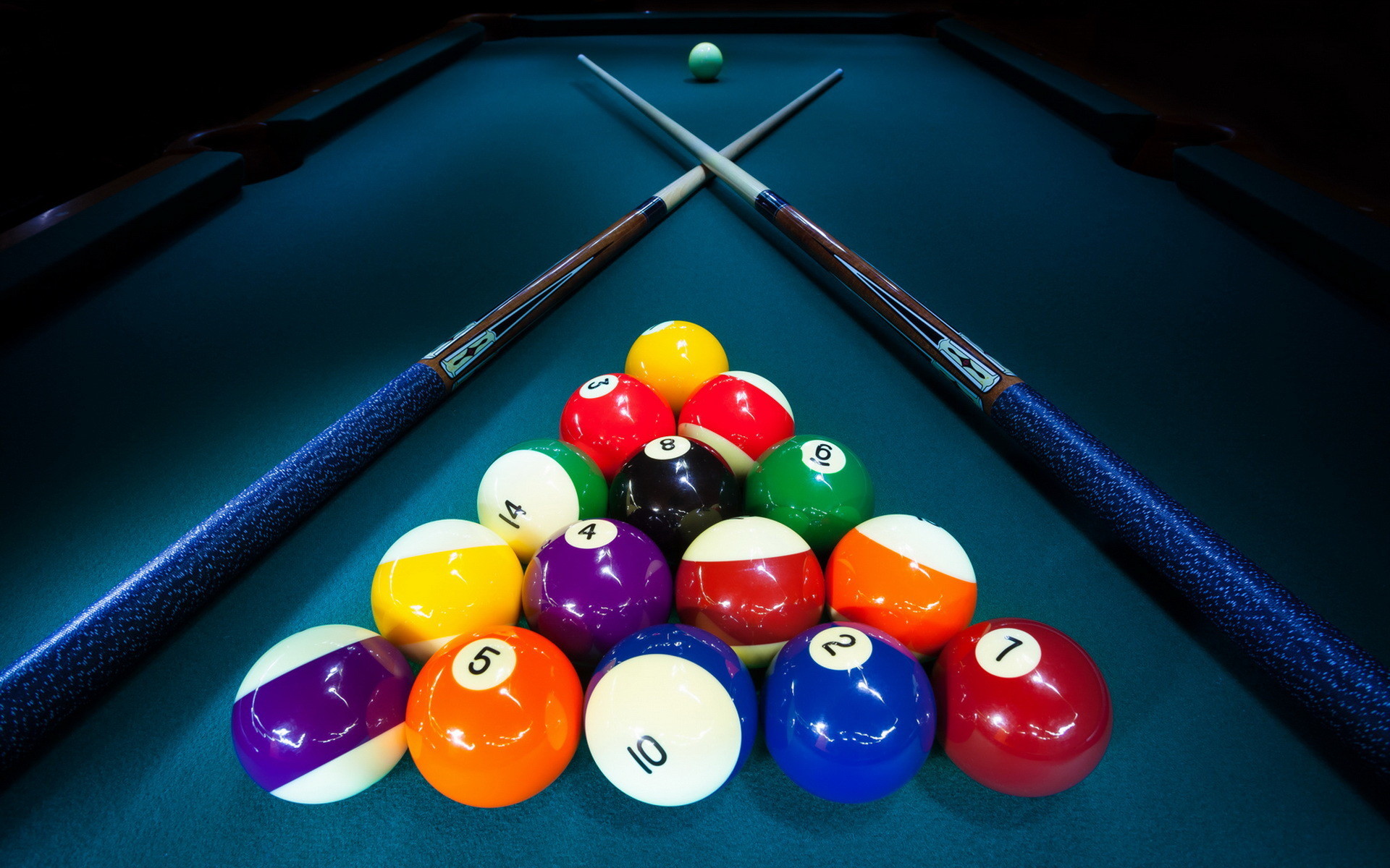 Pool table, cues, billiard balls