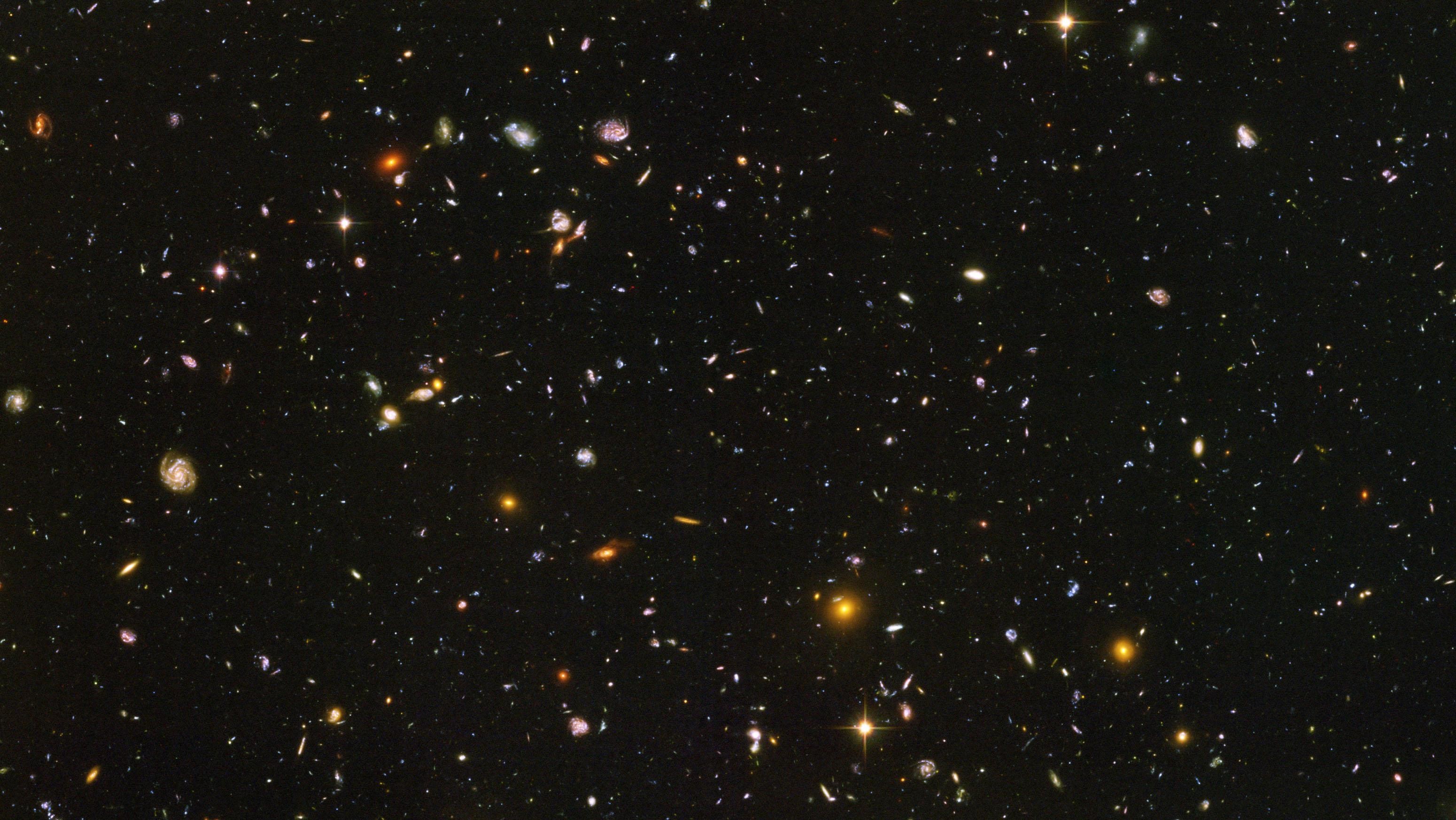 I prefer starry backgrounds. Ive had the hubble deepfield as my background for years.