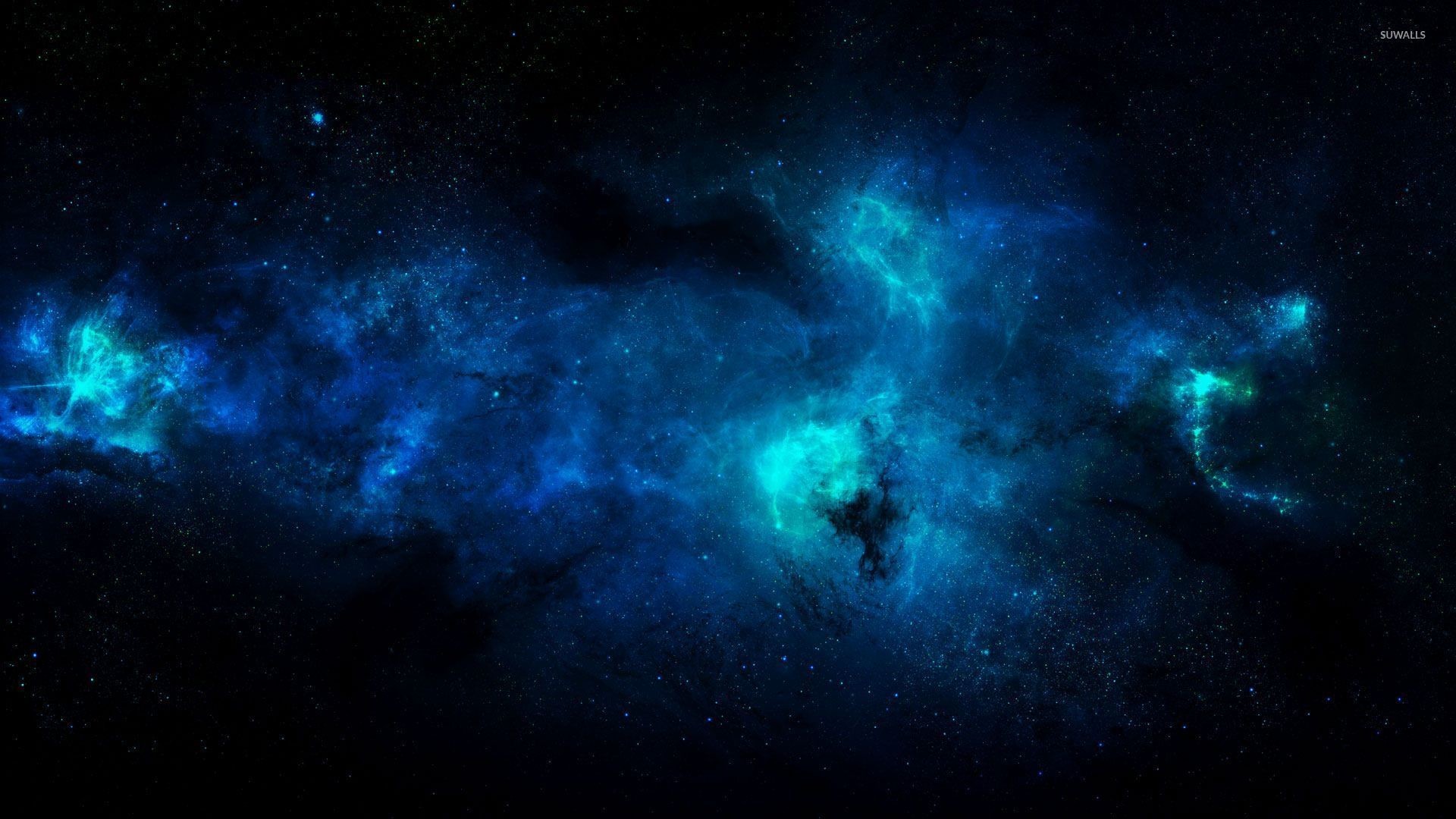Blue nebula illuminating the darkness of the space wallpaper jpg