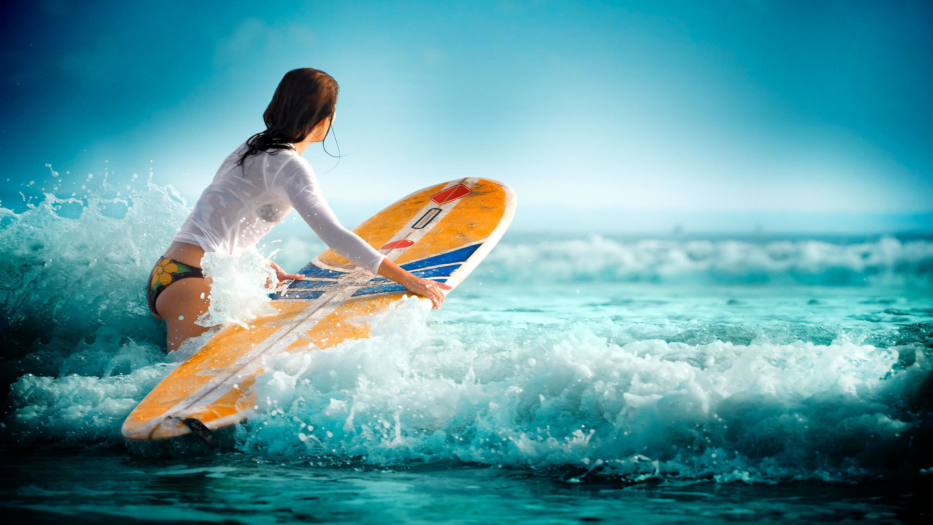 Surfing waves water sea girl wallpaper 117562