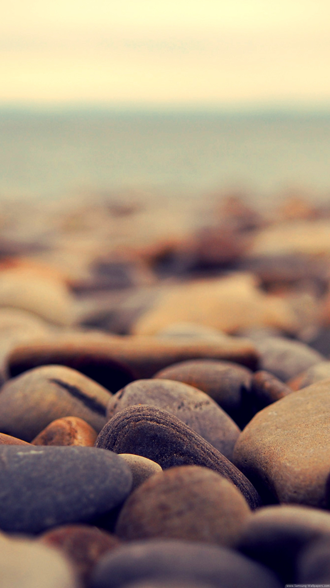 Brown Pebbles On The Beach iPhone 6 Plus HD Wallpaper